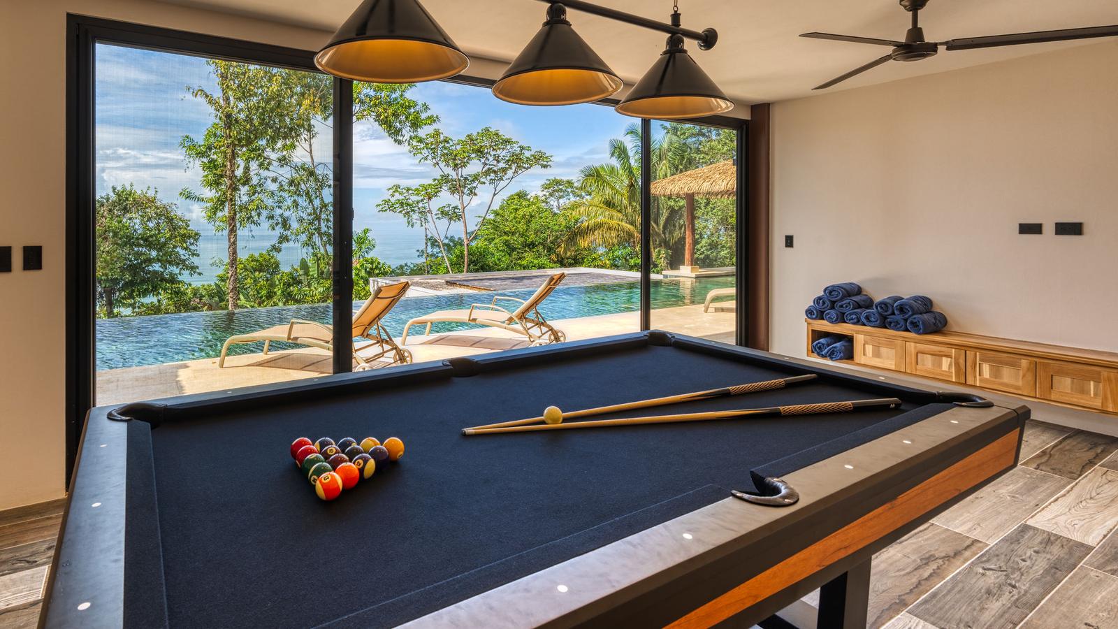 the pool table, with the water just outside