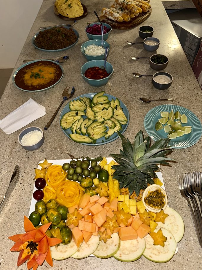 a platter of tropical fruit cut for the table