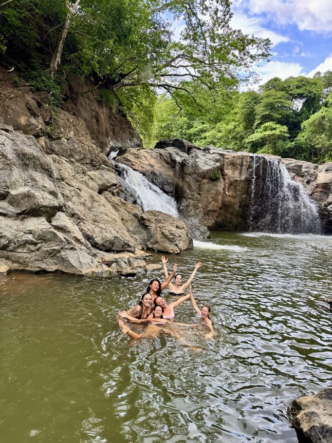 swimming under the waterfall